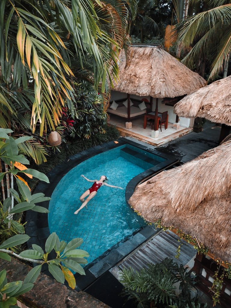 A woman in a swimming pool in Bali.